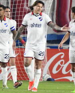 Diego Polenta, Federico Santander y Francisco Ginella buscan explicación en el triunfo de Fénix ante Nacional.