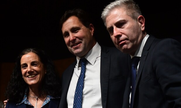 Arbeleche, Labat y Ribeiro durante el evento oficial de transmisión de mando del BCU en la sala Enrique Iglesias de la entidad.