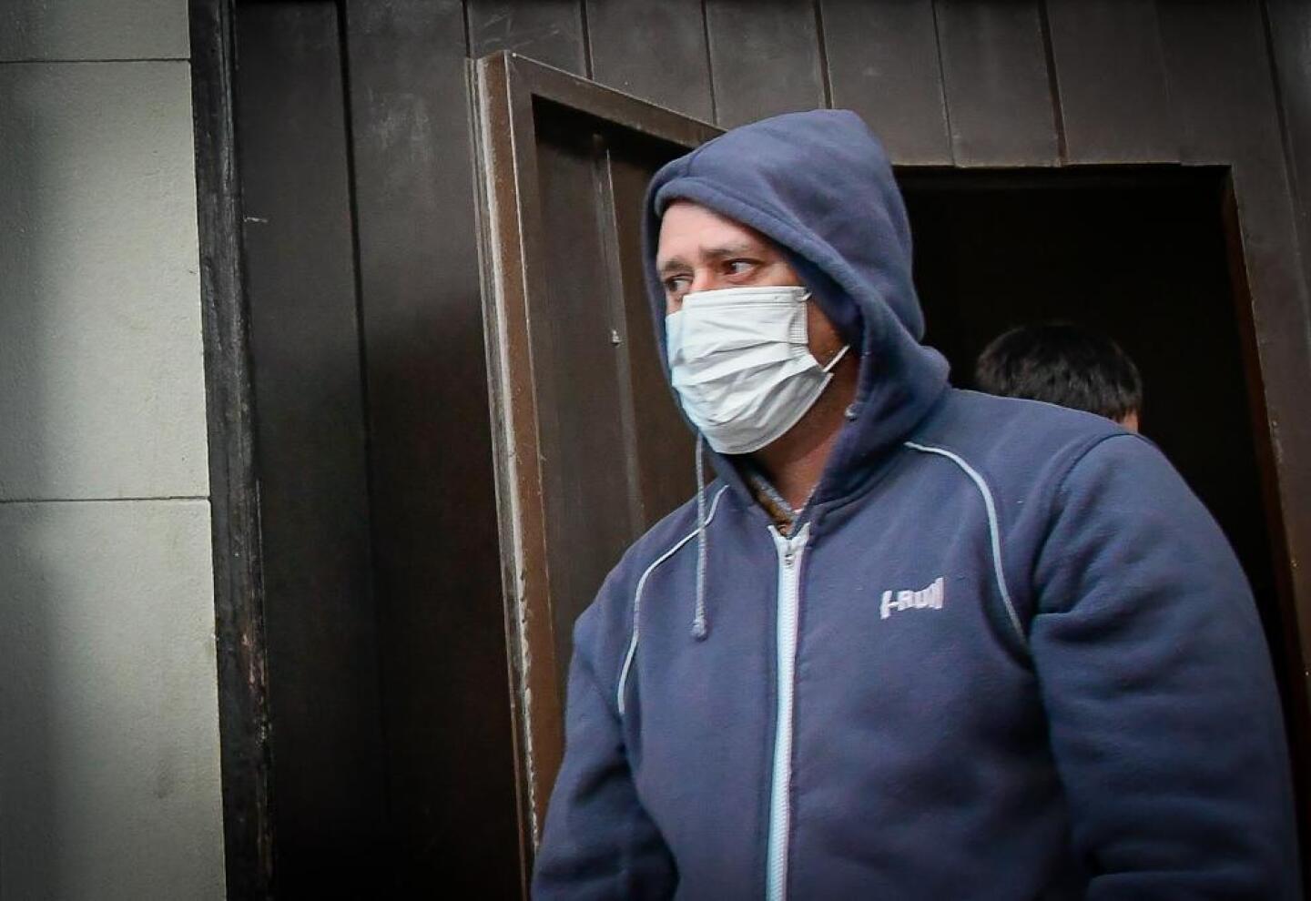 Carlos Taroco, ahora exdirector del ex Comcar, llegando a la audiencia de formalización