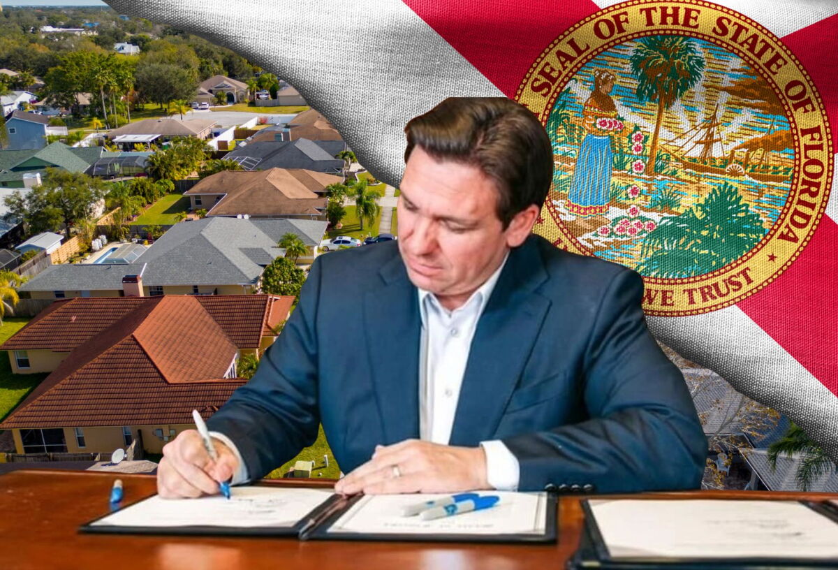 El gobernador del estado de la Florida, Ron DeSantis, promulgando una ley con su firma.