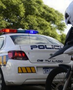 Patrullero y moto de la Policía