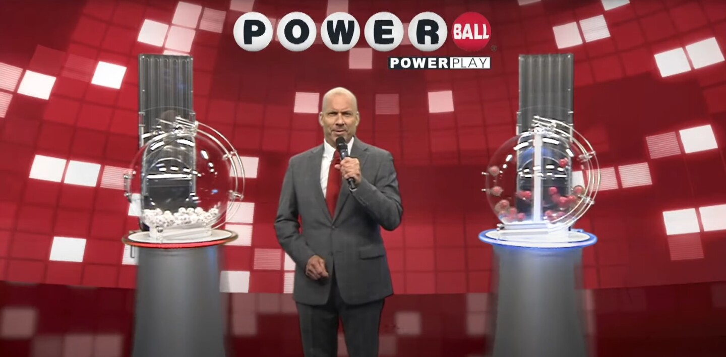 The host and the stick in the Powerball drawing.
