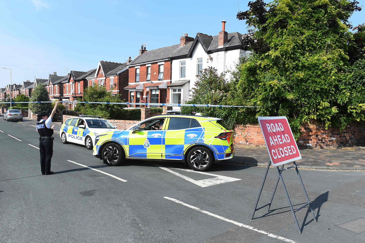 Perímetro policial en Southport, noroeste de Inglaterra, el 31 de julio de 2024, luego de enfrentamientos después de un ataque mortal con cuchillo