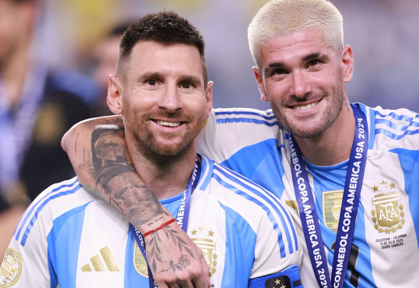 Lionel Messi y Rodrigo de Paul.