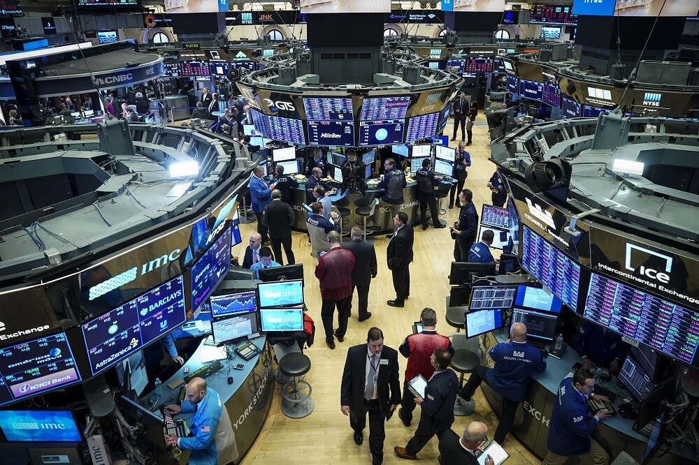 Corredores en la Bolsa de Nueva York.