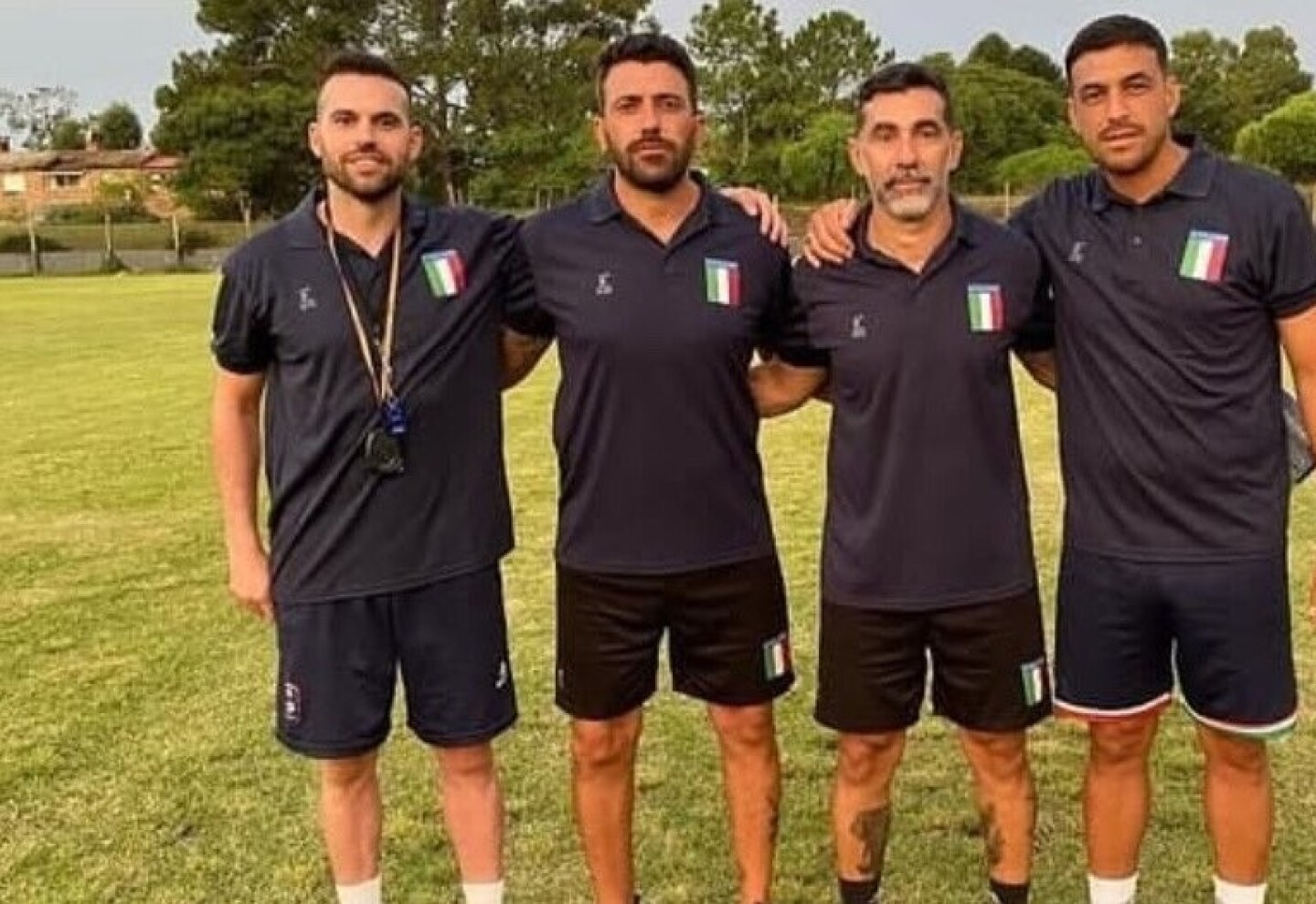 Damián Enriquez con el cuerpo técnico.
